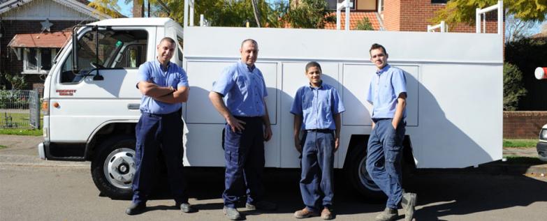 part of our plumbers in Temple City standing by their truck